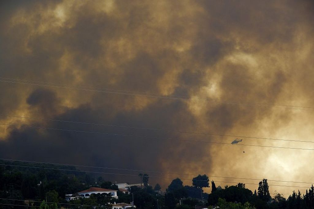 u003cpu003eSpain Wildfireu003c/pu003en © AP/REUTERS