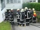 Feuerwehrleute im Übungseinsatz Feuerwehrleute im Übungseinsatz