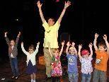 Begeisterte Kinder beim Sing-Workshop