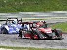 Szene aus dem ersten Spielberg-SCC-Rennlauf: Sandro Bickel (vorne) hält noch Thorsten Rüffer in Schach Szene aus dem ersten Spielberg-SCC-Rennlauf: Sandro Bickel (vorne) hält noch Thorsten Rüffer in Schach