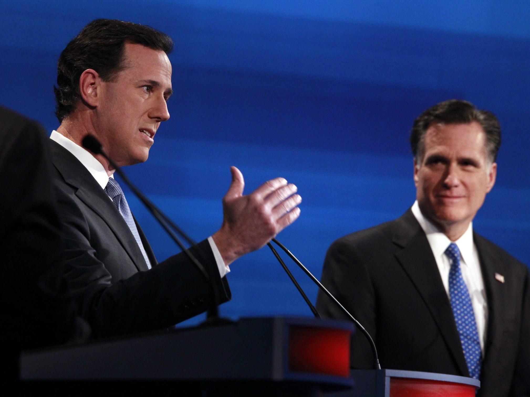 Rick Santorum vs. Mitt Romney. Letzterer obsiegte bei der ersten Vorwahl zur US-Präsidentschaft. Jetzt kommen massive Zweifel auf.