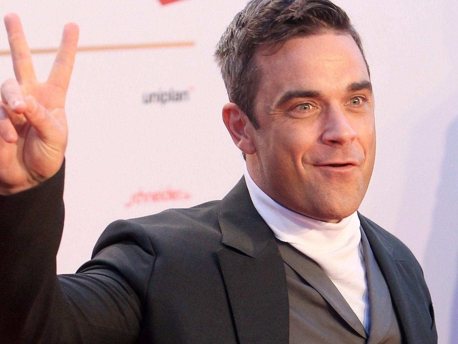 Robbie Williams wurde zum ersten Mal Vater einer kleinen Tochter. Robbie Williams wurde zum ersten Mal Vater einer kleinen Tochter.