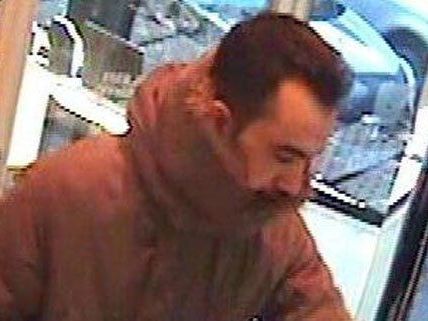 Dieser Mann wird von der Polizei gesucht. Dieser Mann wird von der Polizei gesucht.