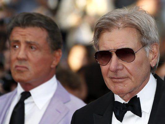 Schauspieler Harrison Ford (rechts) mit Sylvester Stallone bei den Filmfestspielen in Cannes.
