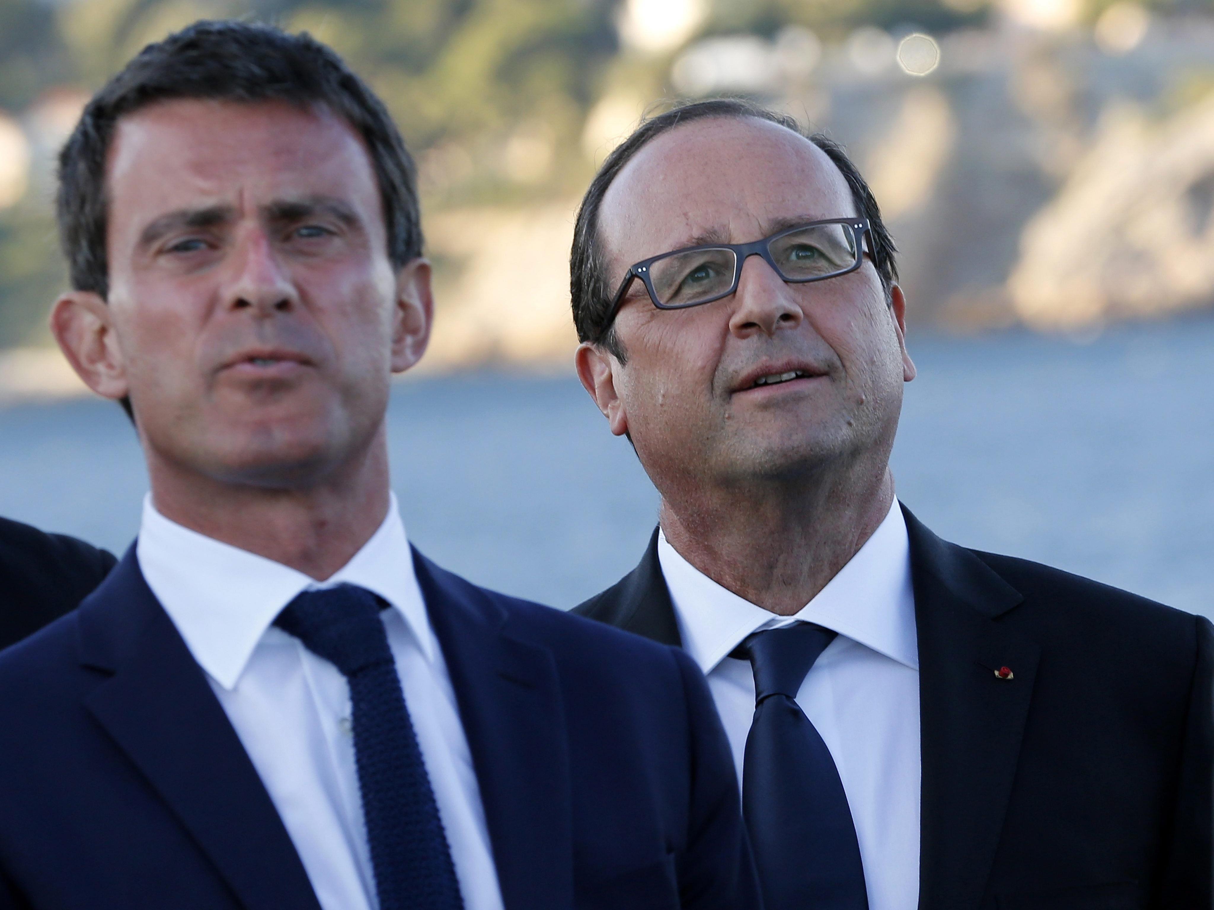 Premierminister Valls (l.) wird am Dienstag bereits die neue Regierungmannschaft vorstellen.