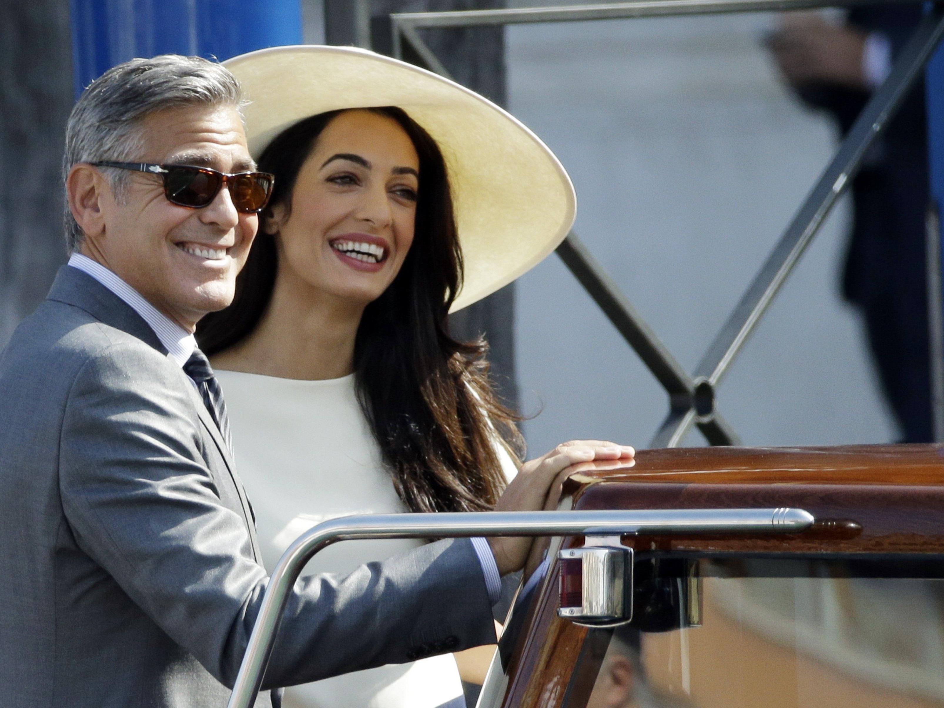 George Cloney und seine Frau Amal Alamuddin