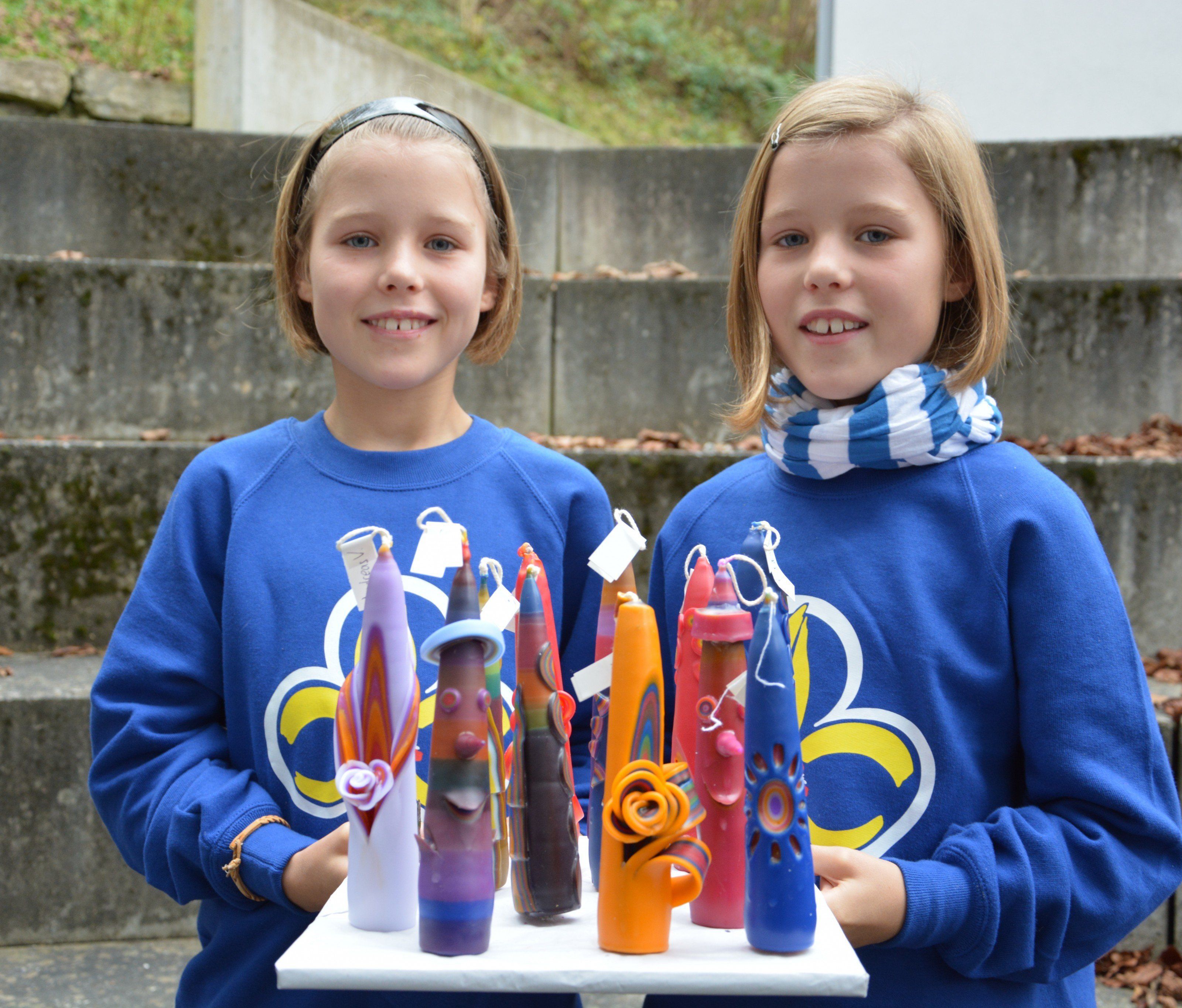 Selbst gezogene Kerzen aus buntem Wachs Selbst gezogene Kerzen aus buntem Wachs