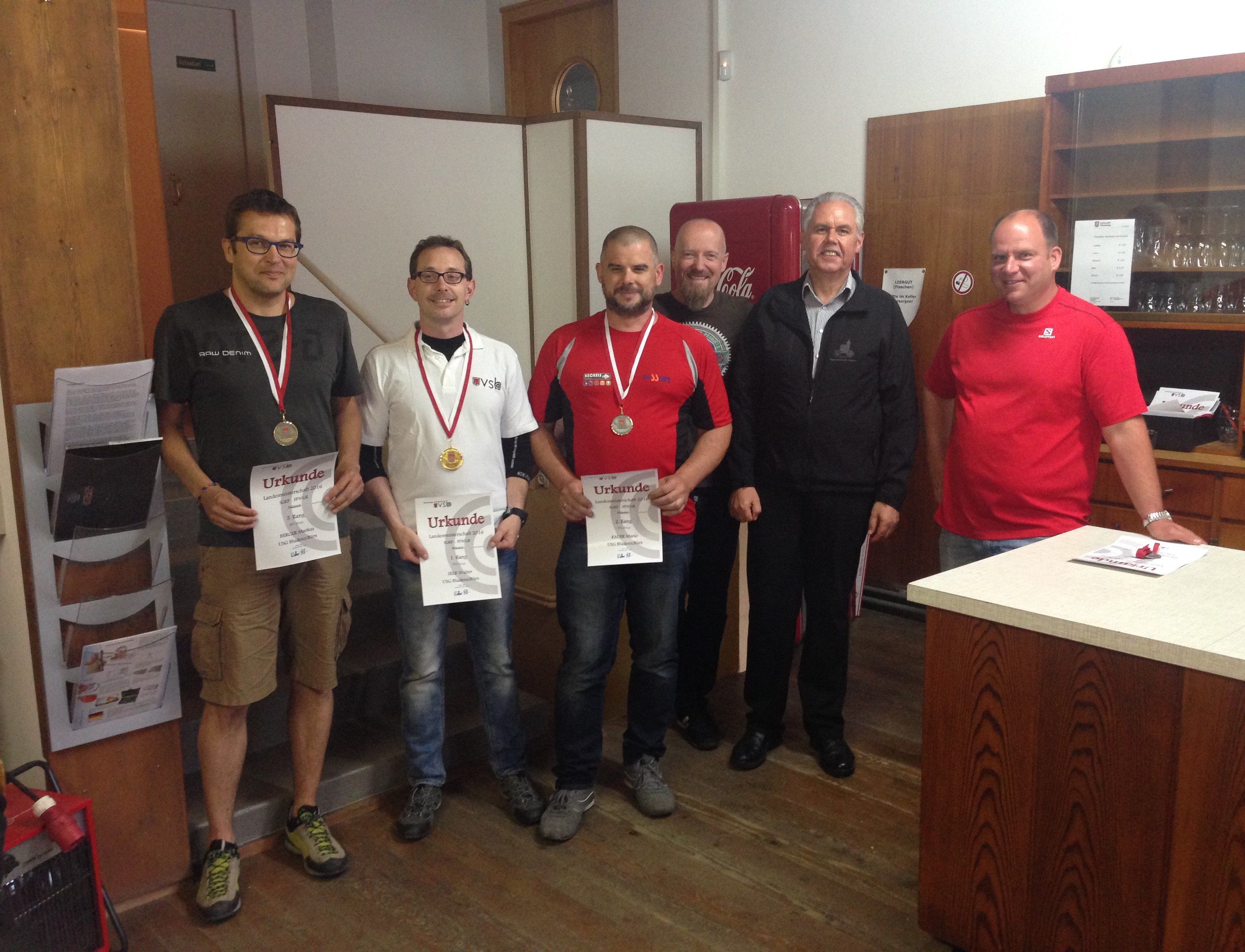 v.l.: Markus Berger (3. Rang), Walter Selb (Landesmeister), Mario Rauer (2. Rang), Thomas Wuggenig, Bezirksoberschützenmeister Dietmar Ammann und Andreas Stoderegger v.l.: Markus Berger (3. Rang), Walter Selb (Landesmeister), Mario Rauer (2. Rang), Thomas Wuggenig, Bezirksoberschützenmeister Dietmar Ammann und Andreas Stoderegger